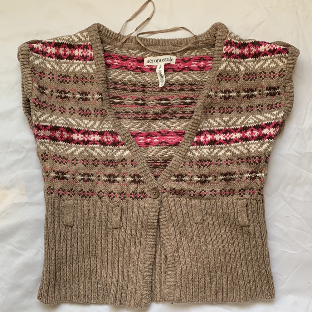 Aeropostale sweater vest, one button.  Size Small.  Excellent used condition